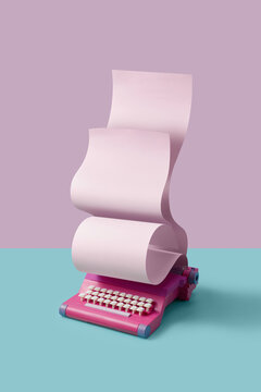 Colorful retro typewriter with blank sheet of paper
