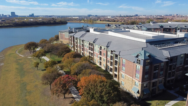 Aerial View Riverside Apartment Complex Wit Downtown Las Colinas, Irving, Texas In Background