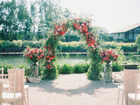 Wedding Arch Made Of Flowers And Leaves 