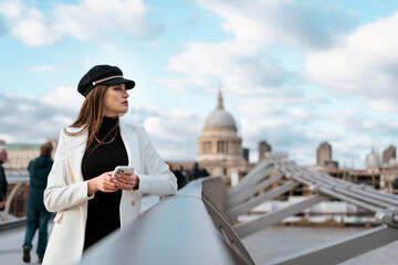 An elegant female tourist in the city