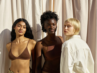 A multicultural group of beatiful women looking at camera