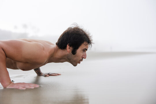 Push ups in the sand.