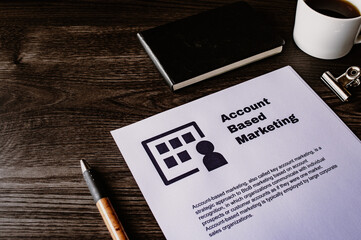 There is dummy documents that created for the photo shoot on the desk about Account Based Marketing.