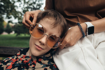 Little boy in big sunglasses