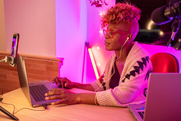 Black Woman Influencer Working Streaming A Video From Home.
