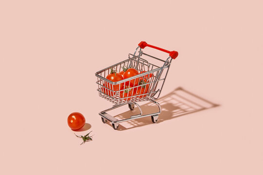 Ripe cherry tomatoes lying inside shopping trolley
