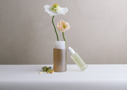 Still life of skincare/haircare product with poppies
