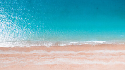 Fototapeta premium aerial photo of a sandy beach with azure water