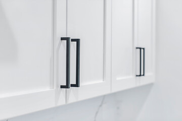 Closeup of Cabinet Doors in a White Kitchen