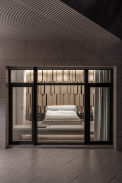 Exterior of modern house with luminous lamps