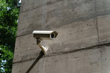 security camera on concrete wall