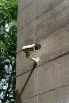 security camera on concrete wall