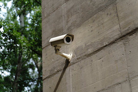 security camera on concrete wall