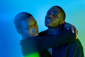 Portrait With Blue Gel Lights Of A Couple In Love.