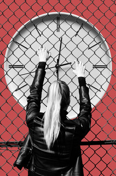 Woman Looking Through The Fence On Clock