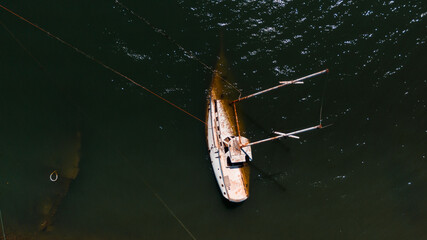 drone photo of a sunken ship near the coastline