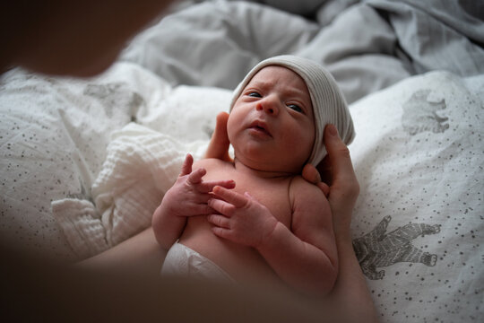 Skeptical Newborn Girl