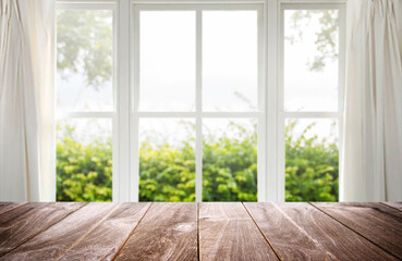 Empty table wooden over window blur background, for your photo montage or product display, Space for placing items on the table, product and food display.