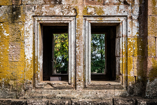 Window at ancient temple ruins in Thailand