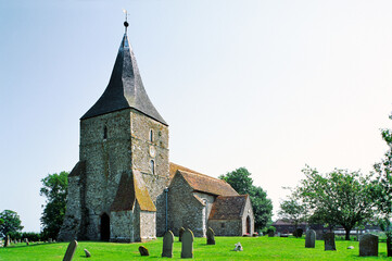 St Mary's Church in the village of St. Mary in the Marsh, Romney Marsh, Kent, England, UK.