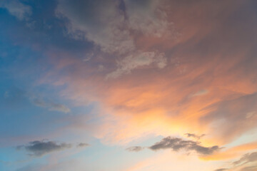 Beautiful sunset and sunrise twilight blue, orange sky, and clouds in the morning above clouds with dramatic light.