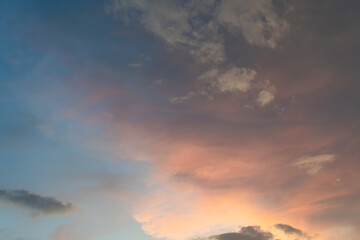 Beautiful sunset and sunrise twilight blue, orange sky, and clouds in the morning above clouds with dramatic light.