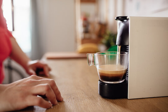Woman preparing espresso 