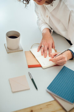 Cropped Image of Woman Working in Office