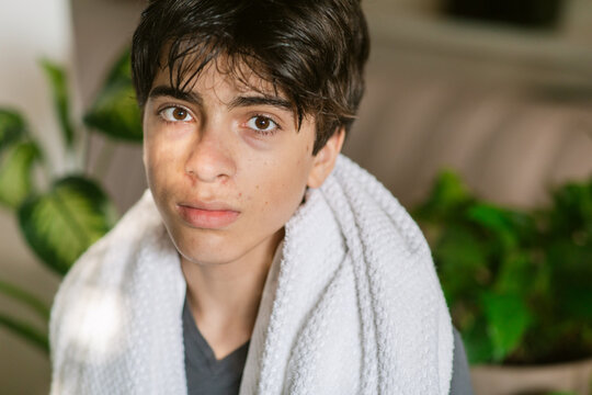 Teenage boy with face treatment portrait