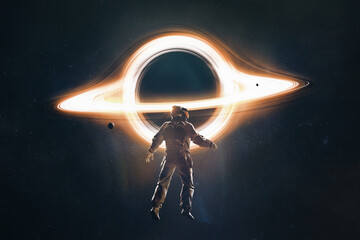 Astronaut in front of a black hole in the universe