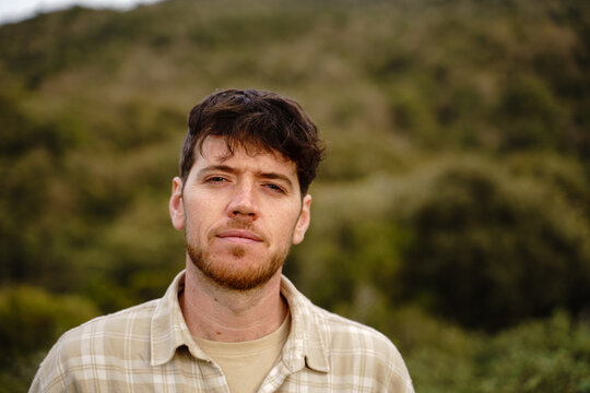 Portrait of confident man in nature