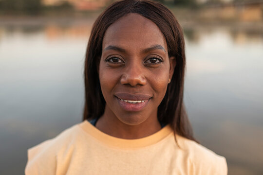 portrait of a black woman by a river