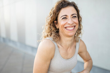 47 year old young woman in sportswear outdoors