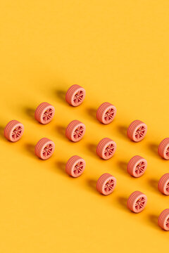 rectangle from pink car wheels on yellow. 3d illustration