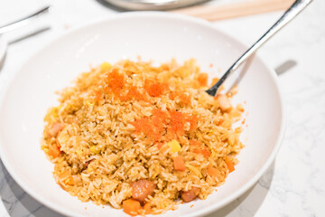 Fried rice with seafood and crab on the plate