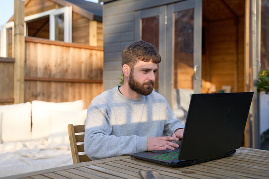 Working from home on a sunny day in the garden
