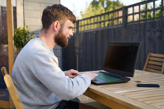 Man working from home in his garden