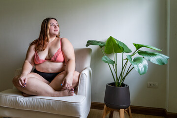 Portrait of a beautiful plus size ginger woman