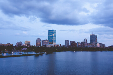 Fototapeta na wymiar Boston city Charles River at dusk with urban skyline and skyscrapers.