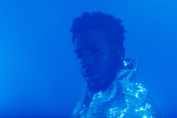 Blue layered studio portrait