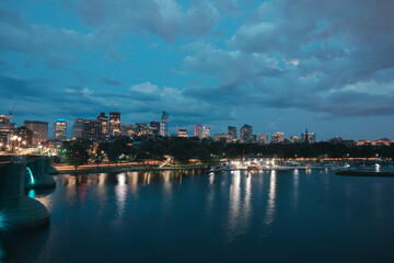 Fototapeta premium Boston city Charles River at dusk with urban skyline and skyscrapers.