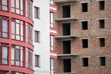 Fototapeta premium Architectural detail of high frame of monolithic concrete building under construction. Real estate development