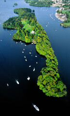 Lake Windermere in the Lake District National Park, Cumbria, England. Aerial over Belle Isle to the town of Bowness.
