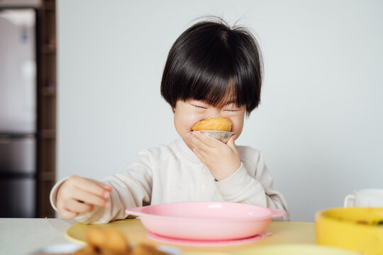Little Asian girl at home
