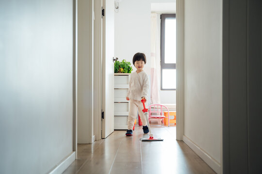 Little Asian girl at home