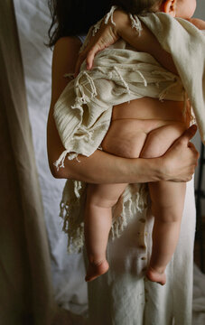 
woman with a baby in her arms