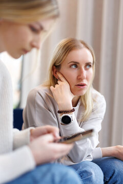 Girl having discussion with her friend 