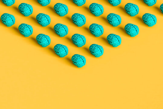 angle from blue brains on yellow background. 3d render