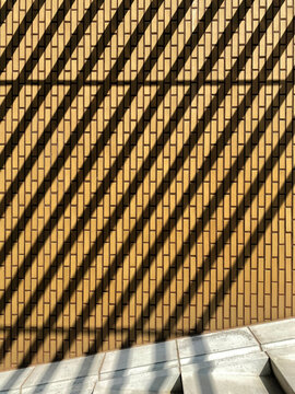 brick wall with shadow stripes