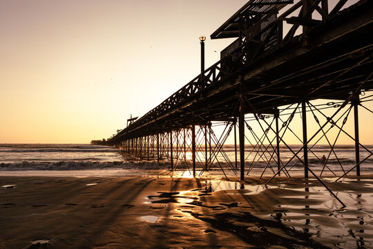 Beach Pier At Sunset